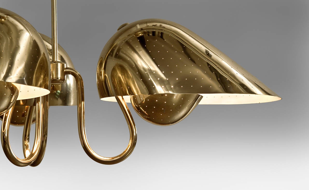20th Century Bertil Brisborg for Bohlmarks: An Adjustable Brass, Bakelite and Wood Chandelier