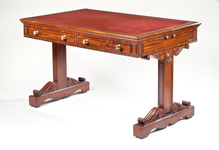 A Trestle Base Regency Mahogany Writing Table
