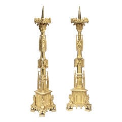 A pair of gothic style ormolu pricket sticks