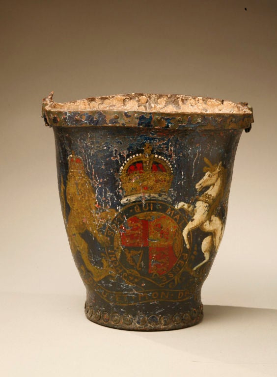 A fine late 18th Century fire bucket with crest depicting the royal coat of arms of the United Kingdom.  The lion represents England and the Unicorn represents Scotland.  They have been used since the unification of England and Scotland in 1603.