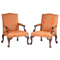 An Important Pair of George III Carved Mahogany Armchairs