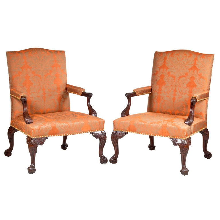 An Important Pair of George III Carved Mahogany Armchairs For Sale