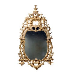 An exceptional English rococo carved and gilded mirror frame