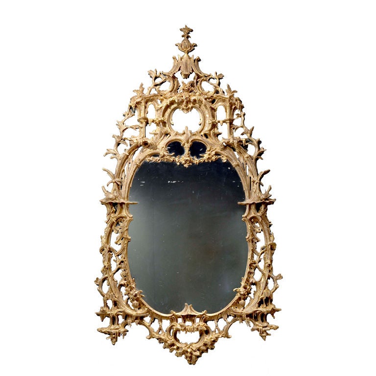 An exceptional English rococo carved and gilded mirror frame For Sale