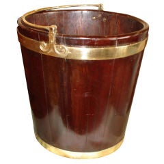A beautiful mahogany peat bucket