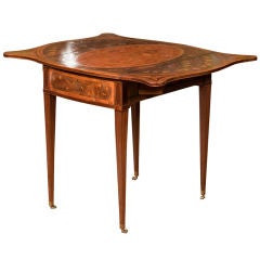 A very fine Pembroke table with exceptional marquetry