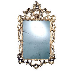 A carved giltwood rococo mirror with excellent proportions