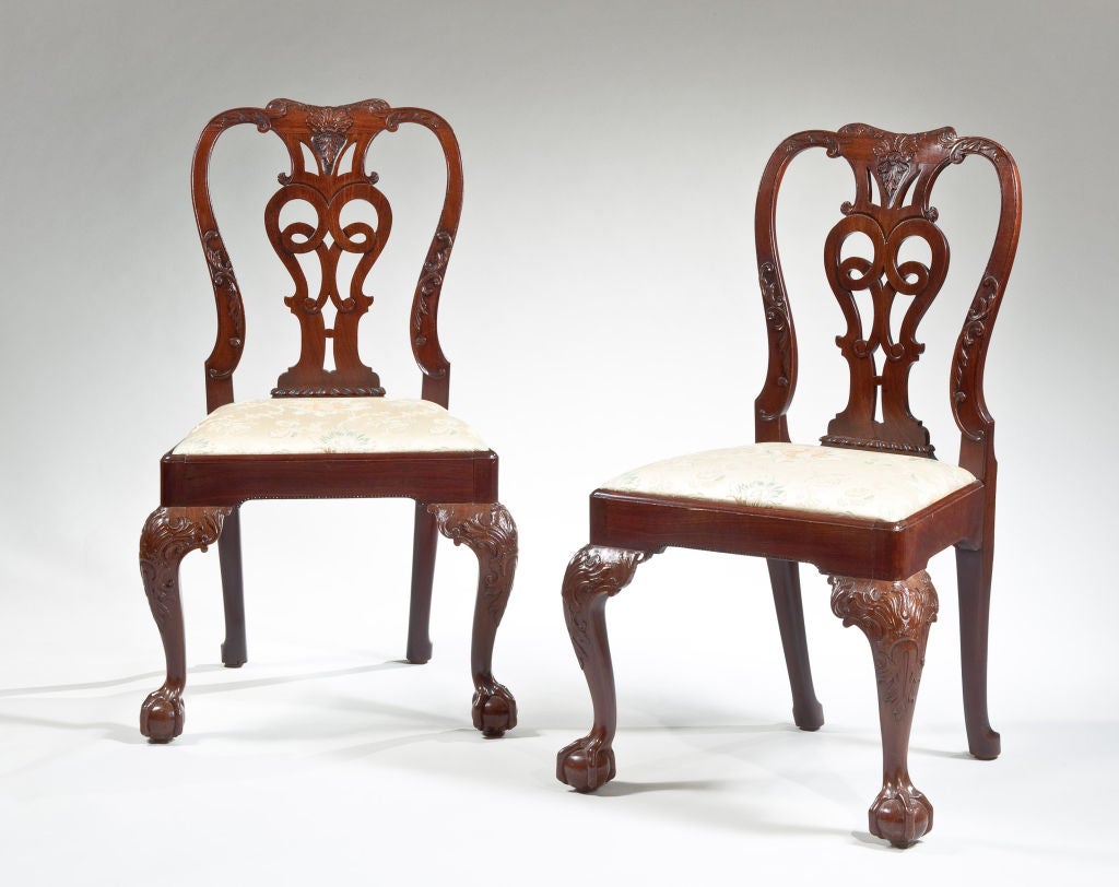 A Superb Set of Eight George II Carved Mahogany Dining Chairs