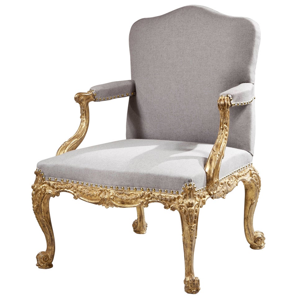 A Fine Carved and Gilded Open Armchair For Sale