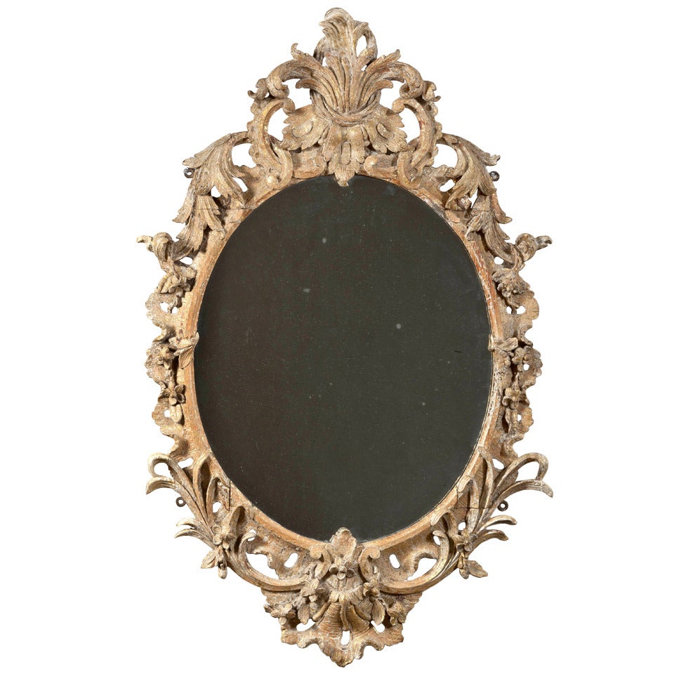 A Fine Carved And Gilt Oval Rococo Mirror For Sale