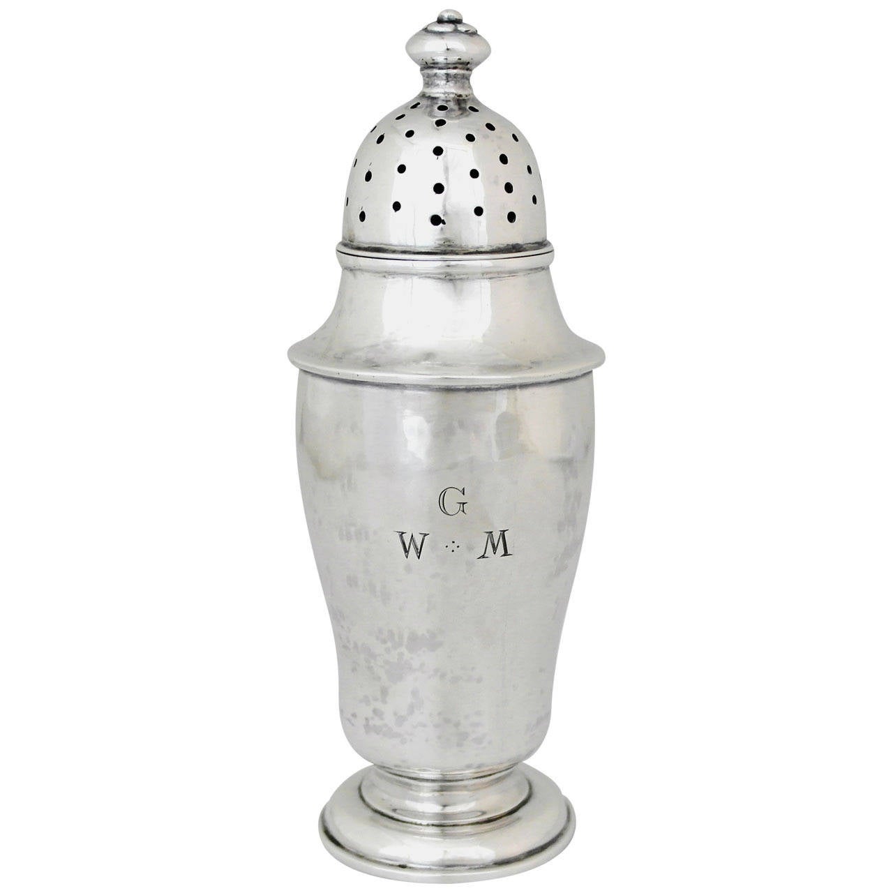 Being offered is a scarce sugar caster by James T. Woolley of Boston, Massachusetts. Incredible handmade caster, an adaptation of an early colonial design, made of heavy gauge silver. Woolley a distinguished member of the Boston Society of Arts