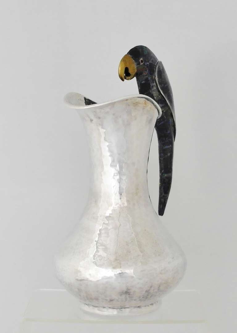 20th Century Los Castillo Silverplate Hand Hammered Parrot Handle Pitcher