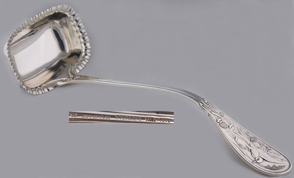 Being offered is a fine circa 1875 sterling silver soup ladle by Tiffany, of New York, in the coveted Japanese pattern, the rectangular bowl with a 'pie crust' rim.  Gold weight 8 ozs.  Dimensions 13 inches long.  No monogram or monogram removal. 