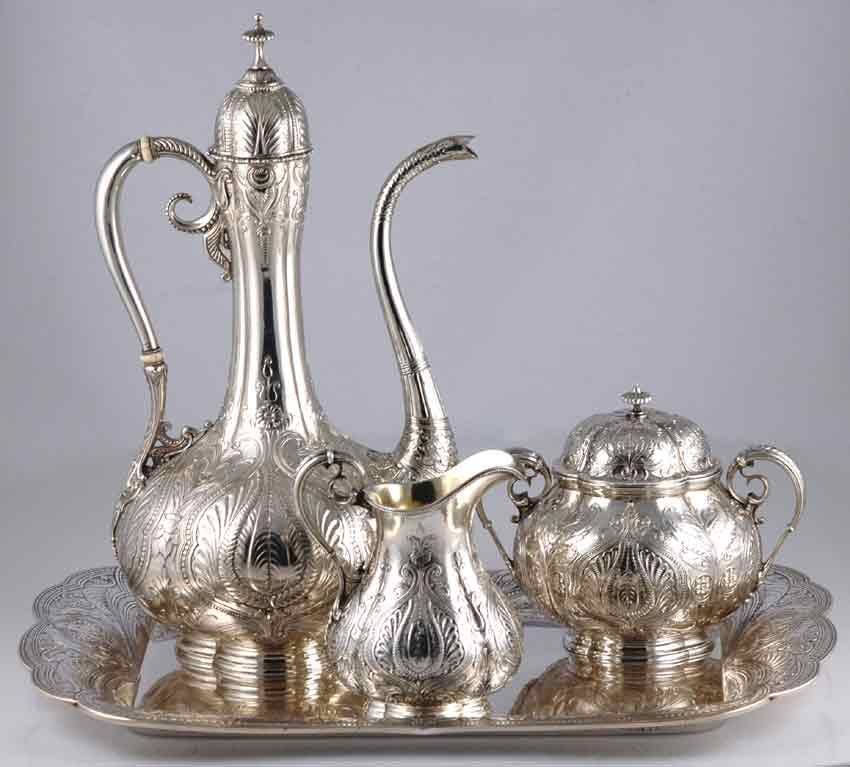 Being offered is a fine circa 1916 coffee service in the 'Persian Style' by Gorham of Providence, RI, which was intended for Gorham's retail store in New York, said store placed a special order for the matching tray.  The chasing on all four pieces