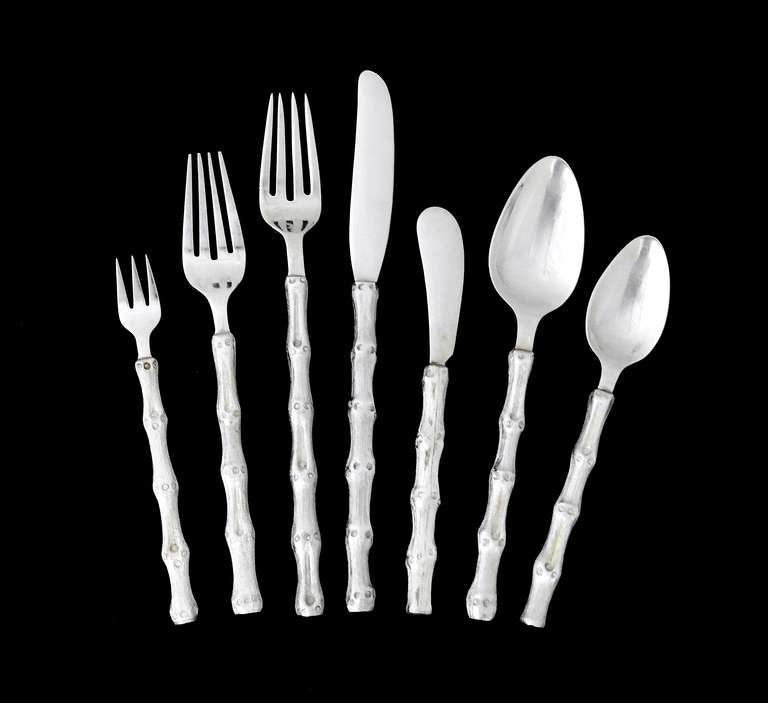 Being offered is a circa 1970 sterling silver flatware set by Janna Thomas of Taxco, Mexico, with eight place servings, eight pieces per place serving. This is a superb set by artist Thomas, the handles in a motif of textured bamboo. Dimensions