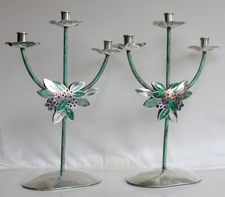 Being offered is a one-of-a-kind sterling silver and stone insert table garniture by Emilia Castillo, of Taxco, Mexico, each with a hand-hammered finish throughout the set with malachite, lapis lazuli and other various stones, comprising a massive