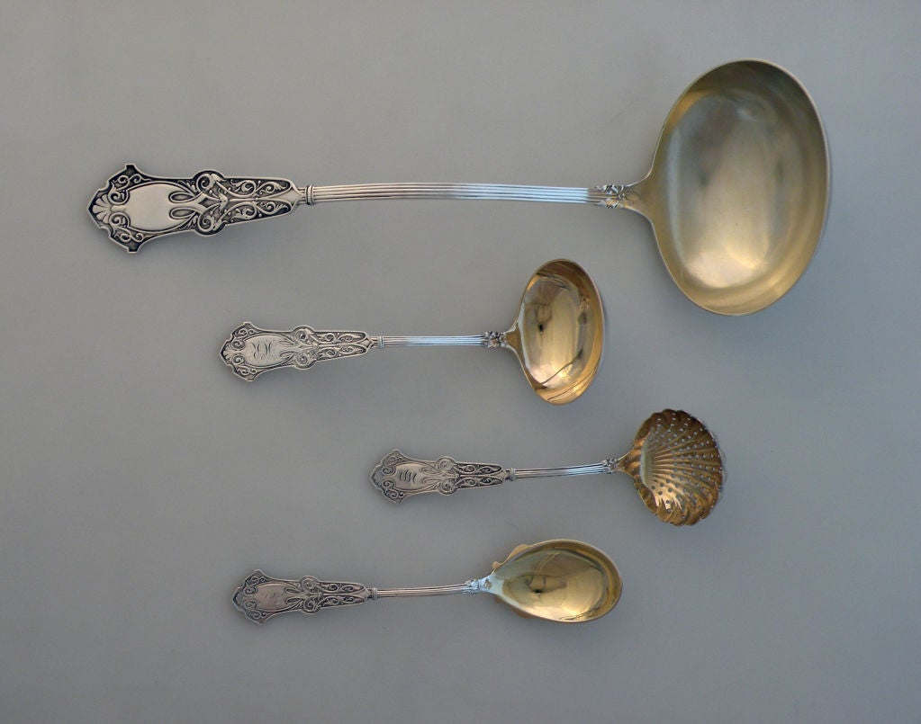 Being offered is a superb and rare circa 1880 223 piece (place pieces and servers) set of sterling silver flatware in the Alhambra pattern by Whiting of New York.  The superb diecut pattern, a Moorish motif (see below for information regarding the