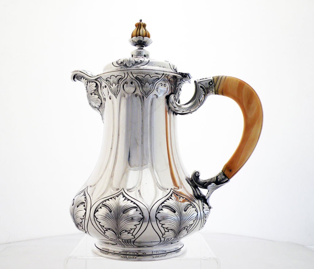 Being offered is a fine circa 1900 sterling silver, originally designed as a chocolate pot (but also a wonderful espresso, tea or coffee pot also!) by Gorham, of Providence, RI, in the coveted Athenic pattern, with hand chasing of 'Athenic' leaves
