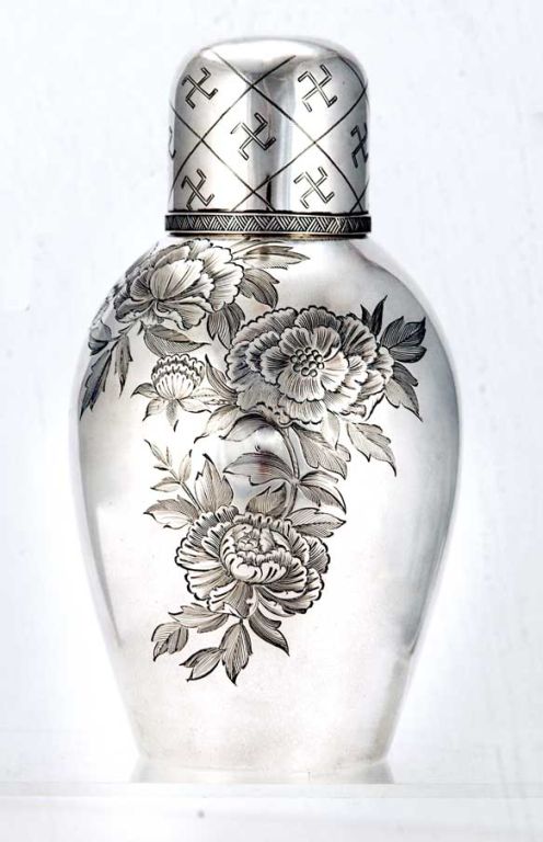 Fine circa 1873 sterling silver tea caddy by Tiffany & Co. of Union Square, New York, the body engraved with flowers, leaves and other aesthetic motifs. The engraving is superb and was performed by a master craftsman/designer. 

Weight 15 oz.
