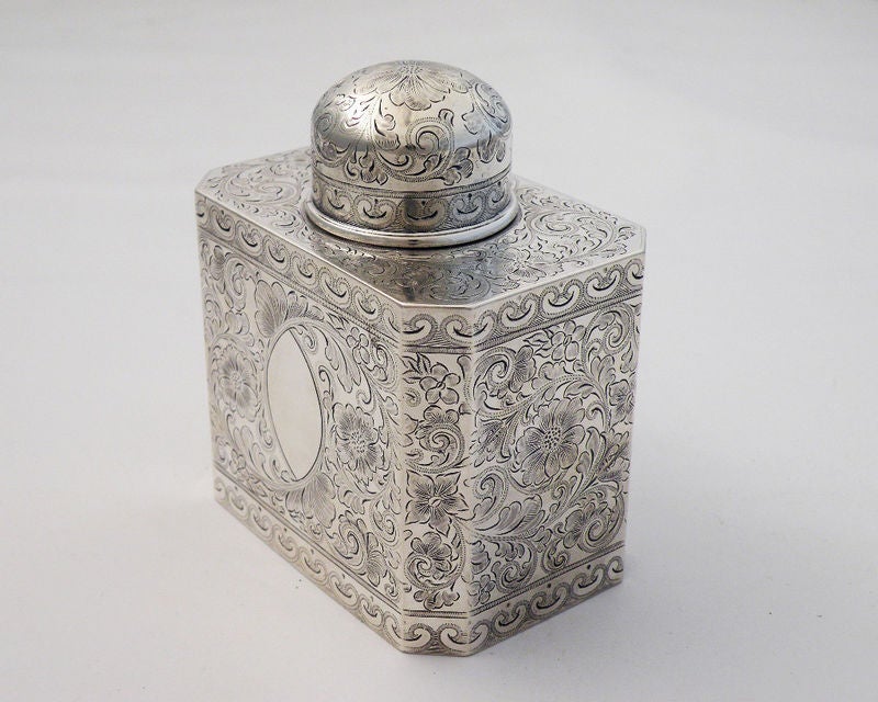 Being offered is a fine circa 1890 sterling silver tea caddy  by Theodore B. Starr, of New York, the lid and entire body masterfully engraved and brightcut in a floral and foliate motif.  Dimensions 3 7/8 inches long by 2 1/4 inches wide by inches