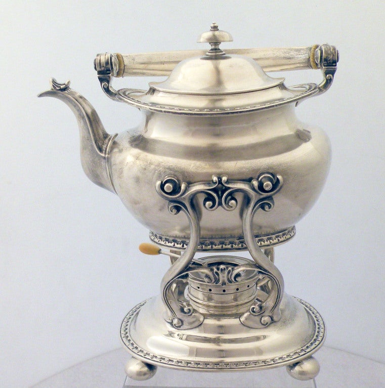 Please visit Lauren Stanley; telephone for an appointment.

Being offered is a large and impressive circa 1927 sterling silver 6 piece plus tray tea/coffee set by William B. Durgin and Gorham comprising a hot water kettle on stand, coffee pot,
