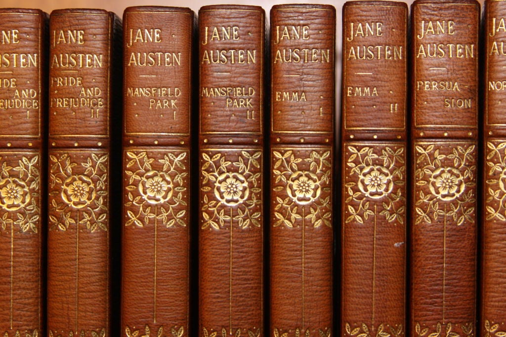 Jane Austen Novel  complete in ten volumes  bound in three quarter green morocco<br />
with cloth  and leather covers, spine  faded to  a even brown, git titles, raised bands,<br />
top edge gilt  marbled endpapers, illustrated frontispiece.