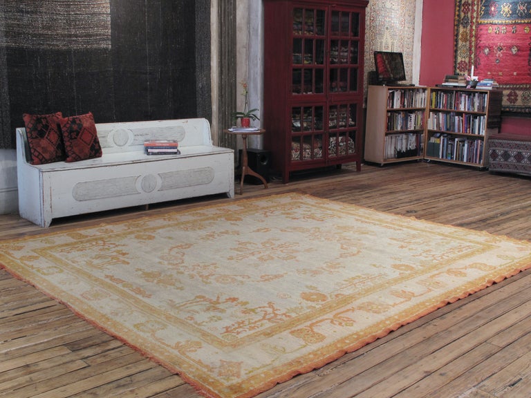 Antique Oushak carpet or rug. An absolutely outstanding antique decorative carpet or rug. Art Nouveau inspired design carpet - the best examples of Oushak weaving display the close interaction between Oriental carpet production and the aesthetic
