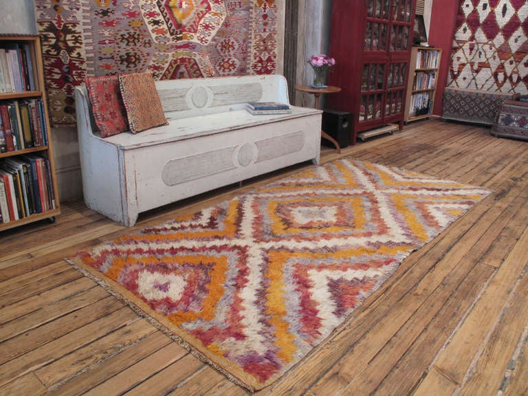 A old tribal rug from Central Turkey with shaggy pile in the 