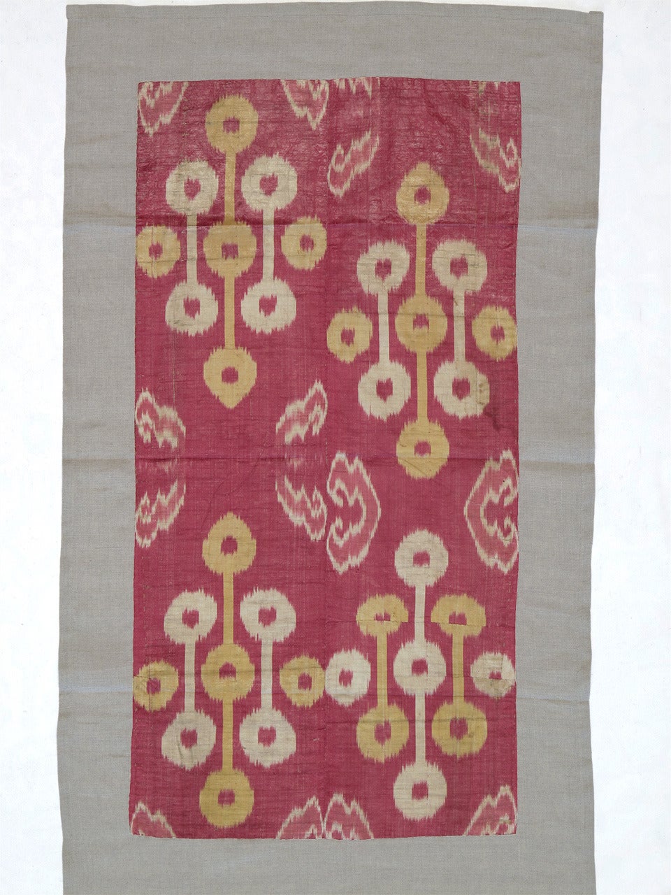 Antique Silk Ikat panel. A beautiful antique textile from Uzbekistan in Central Asia, a fragment from a larger panel woven in silk ikat technique. Such fabrics were traditionally used to make garments or as ceremonial covers.

The piece is