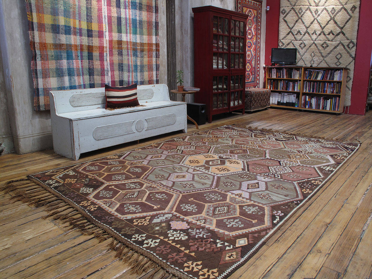 A large tribal Kilim rug from Northeastern Turkey, from the province of Kars, featuring a simple design and the characteristic color palette of the region with lots of natural brown wool. A very handsome example, well-proportioned and in excellent