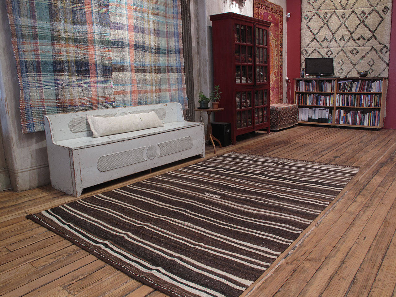 A simple tribal floor cover from Central Turkey, woven entirely with natural brown wool. A coarse, almost Primitive weaving with great modern/contemporary appeal. Very sturdy and suitable for high traffic.