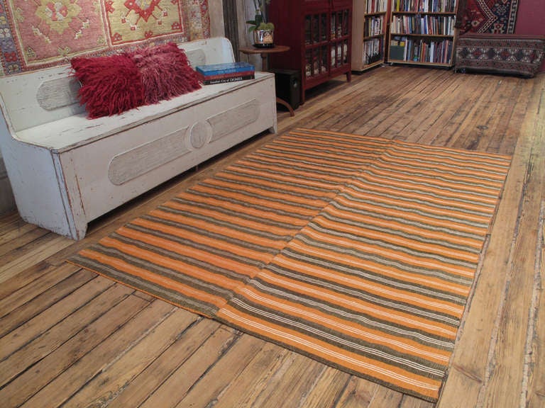 Striped Cover rug. A simple old cover rug from Southern Turkey woven in two panels on a narrow home loom. Rug is sturdy enough to be a floor cover in a low traffic area. Rug would also make a great bed cover, tablecloth or a stylish picnic blanket.