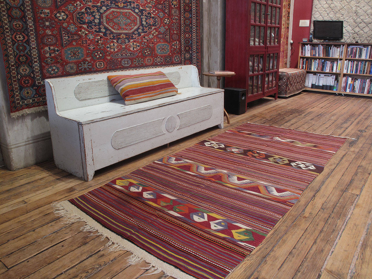 Konya Kilim rug. A beautiful old tribal flat-weave rug from Central Turkey. The weaver's use of four different designs in the wider bands, rather than repeating, is quite unusual. A very high quality and very sturdy Kilim rug.