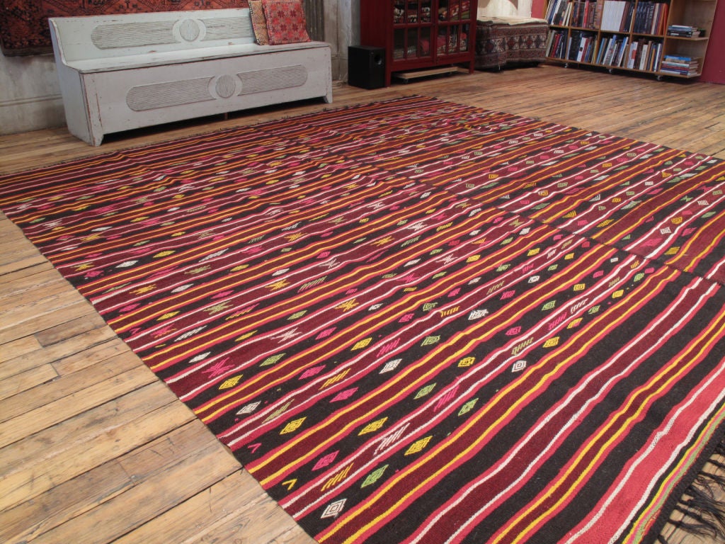 Pair of Banded Kilims rug. A matching pair of goat hair Kilims, joined to make a large floor cover. Rare find and the colors of the rug are great.