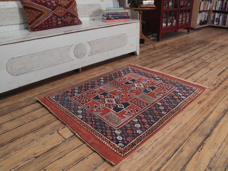 Antique Avunya rug. A superb little antique rug from Northwestern Turkey, displaying the best interpretation of a well-known design in the field, surrounded by a very rare border, all executed in the best colors we expect from this region. Avunya is