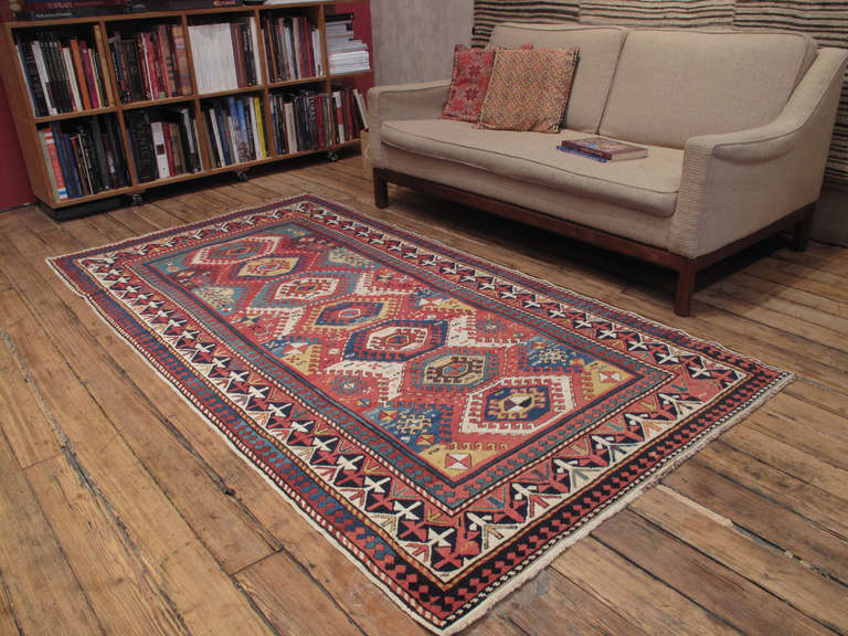Superb Antique Shirvan rug. An impressive example of Southeastern Caucasian weaving, attributed to the prolific weaving center of Shirvan. The design is highly unusual for this region and is often associated with so-called 