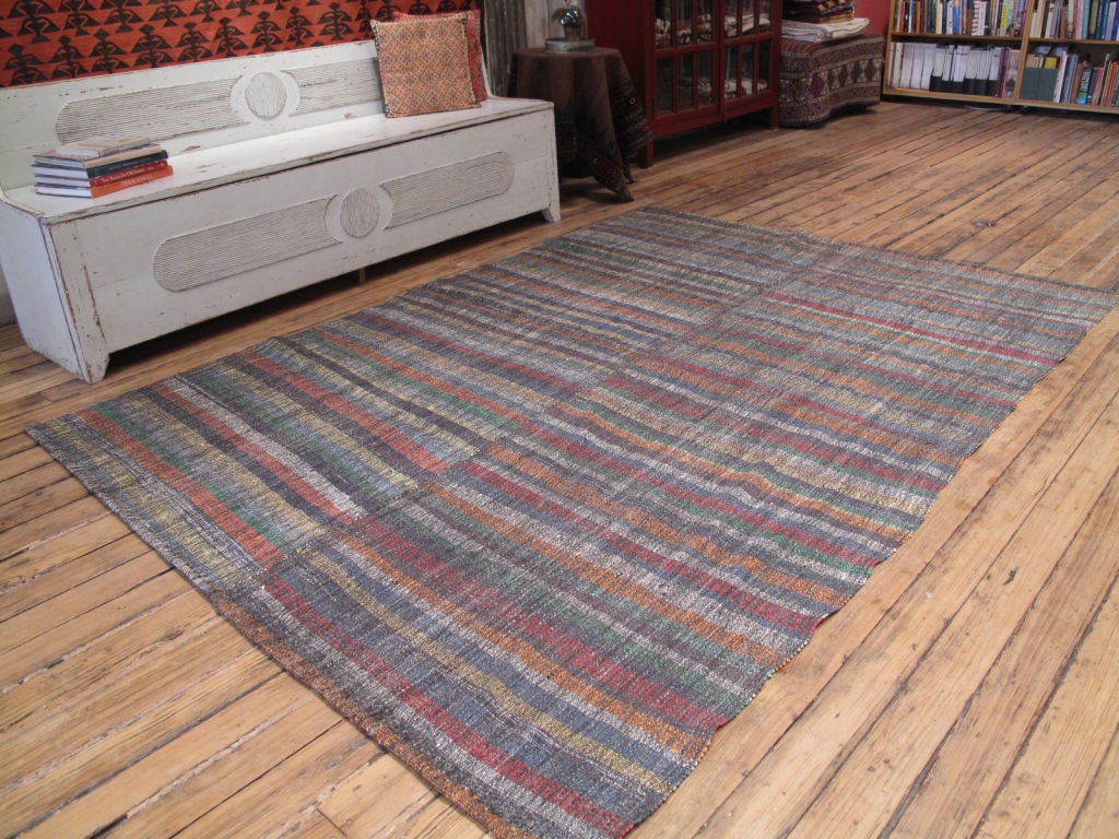 Pala Kilim rug. A tribal floor cover or rug, woven with goat hair, wool and cotton rag, creating a surprising effect through color and texture.