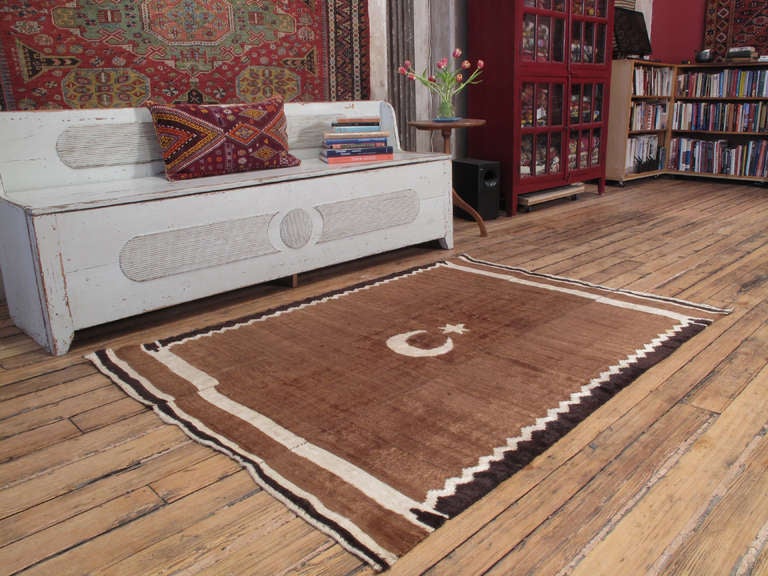 Angora blanket rug. An old blanket or rug from Eastern Turkey, woven in three panels on a narrow loom, featuring the symbols on the Turkish flag. Great patina and amazing quality weave.