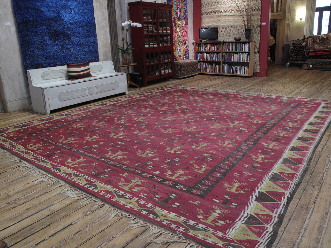 A very large antique Kilim from the Balkans, in a style generally attributed to Manastir, present day Bitola in the republic of Macedonia. This is one of the centers of weaving in the Balkan Peninsula with centuries old tradition of making large