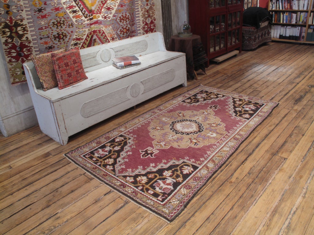 Maden rug. A lovely old village rug from Central Turkey, featuring a folksy interpretation of a rather formal design. Rug has charming details, unusual color palette.