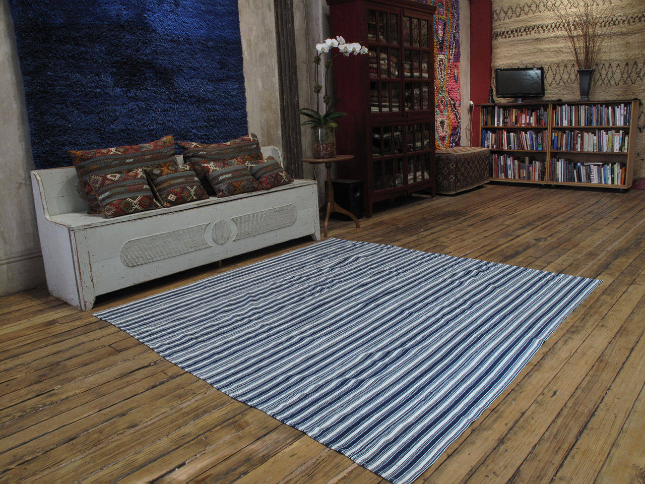 An old tribal cover by the Shahsavan of Azerbaijan, woven with hand-spun cotton in alternating stripes of indigo and white. Wonderful patina and blanket, like handle. Sturdy enough to be used as a floor cover in low traffic. Would be ideal as a bed