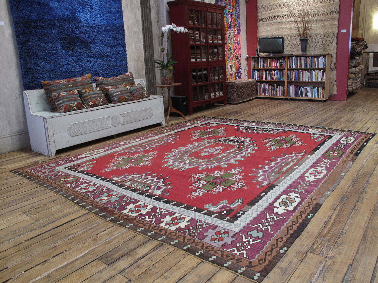 A large flat-woven carpet from Southeastern Europe, featuring a design not often seen in this region. A relatively recent but very high quality weaving in excellent state of preservation.