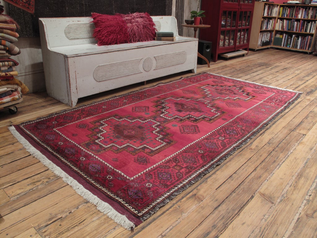 Baluch rug. A very nice tribal rug from the Baluch weavers of Afghanistan. Not very old, but certainly an authentic, this rug is a home-made piece with excellent wool and attractive colors.