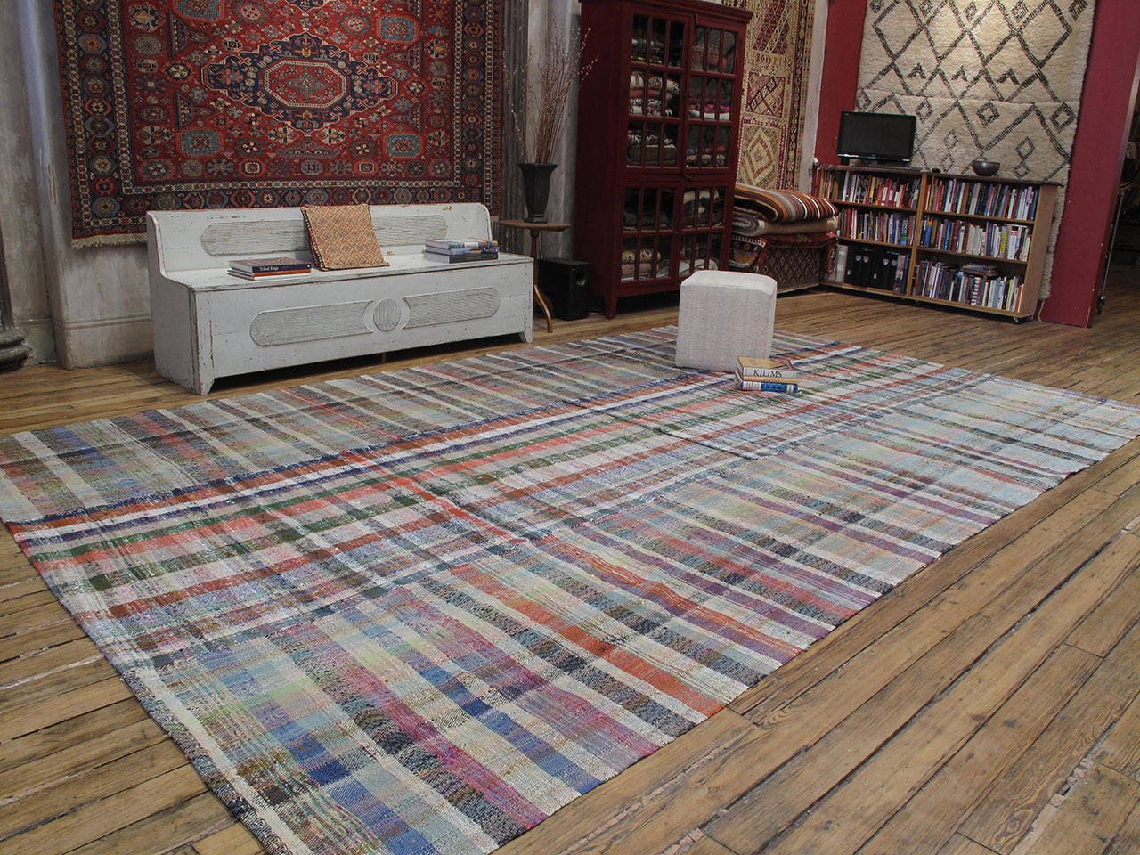 A simple old tribal Kilim from Southeastern Turkey, consisting of three panels, woven with an interesting mixture of colorful cotton rag and yarn and originally used as an everyday utilitarian floor cover. This is one of the nicest we've discovered