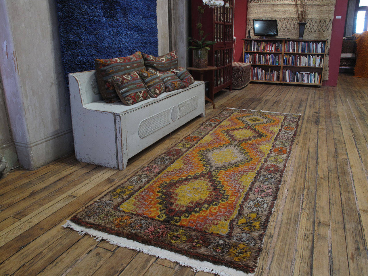 Konya long rug or runner. A great old shaggy village runner rug from Central Turkey, woven in the characteristic long format, featuring a very basic and Primitive design. Rug has very soft and shiny wool and unusual color palette. A very nice