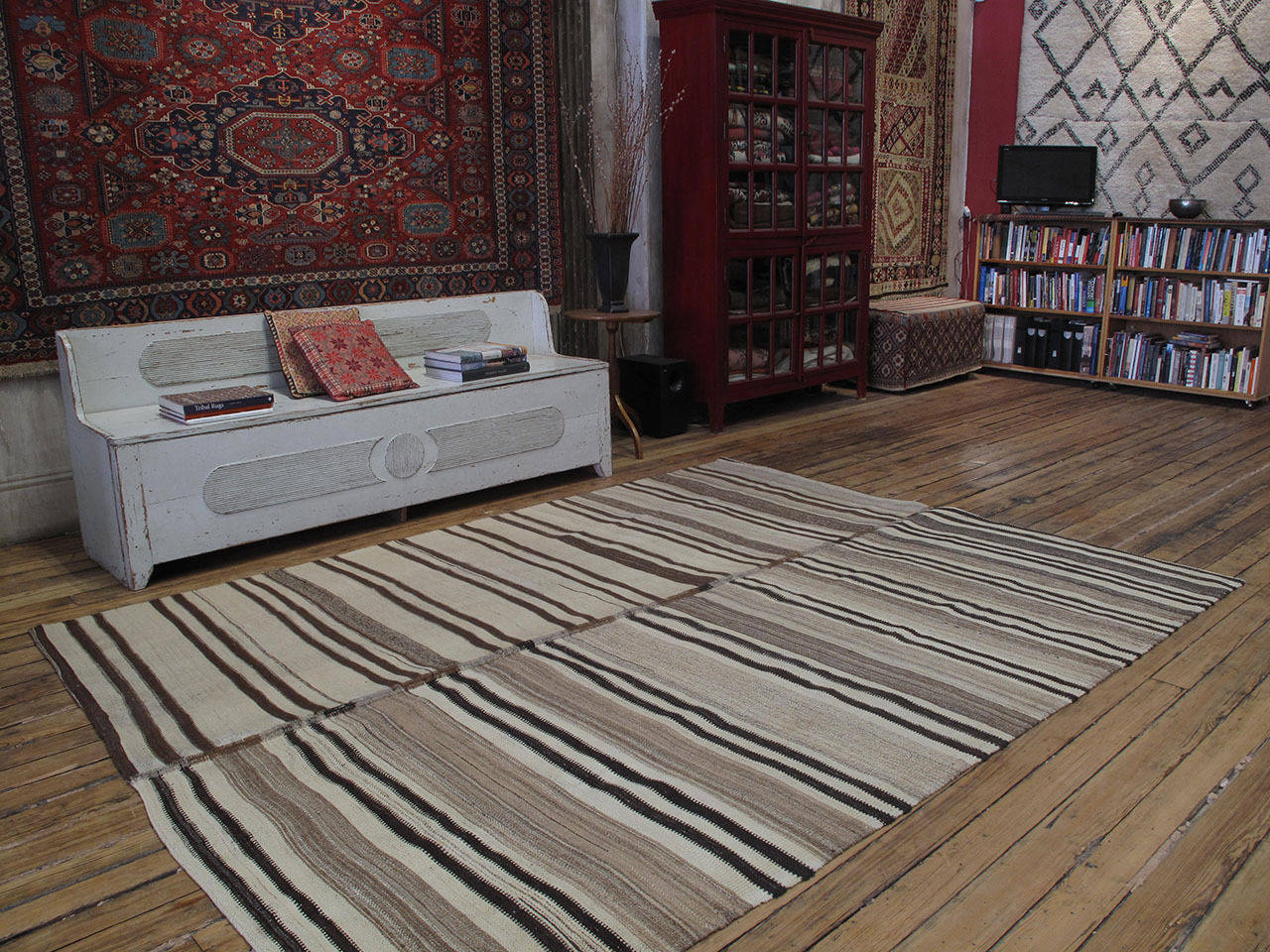 A simple tribal floor cover, woven in two, not-quite-identical panels, using only wool in natural, un-dyed tones. Very sturdy and in larger-than-usual proportions, this is a very high quality example with great modern/minimalist appeal.