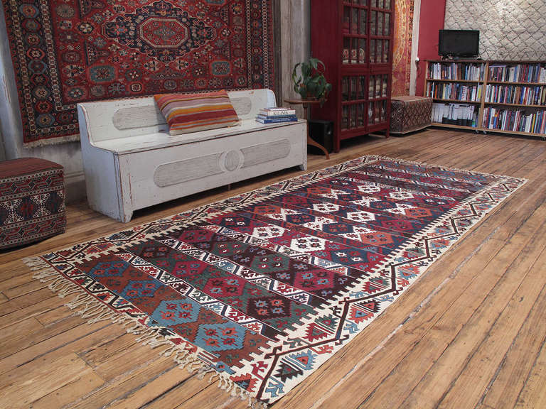 Antique Central Anatolian Kilim rug. A great example of Anatolian Kilim rug weaving from the 19th century when tribal women wove such pieces as part of their dowry and proudly displayed them in their homes. With excellent wool and highly saturated