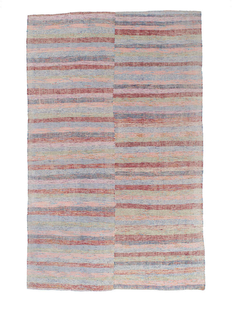 Pala Kilim rug. A simple tribal floor cover or rug, woven with an interesting and appealing mixture of  cut-up pieces of colorful cotton fabric. Rug has great look and texture and a very light color palette.