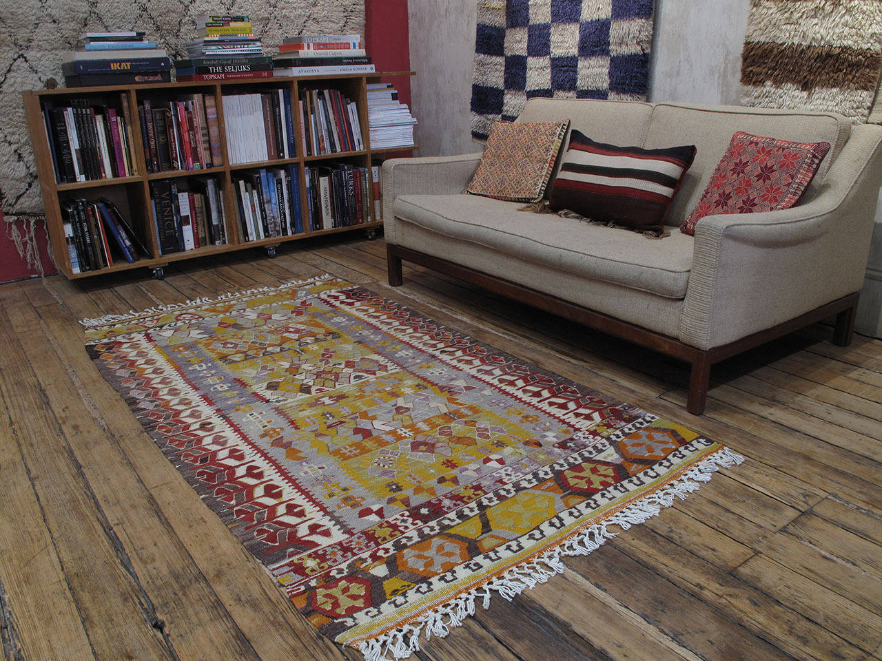 A beautiful old tribal flat-weave from Western Turkey in small format. Using characteristic motifs of her tribe, the weaver created a unique composition, full of whimsical details. The soft color palette adds to the charm. A great example of