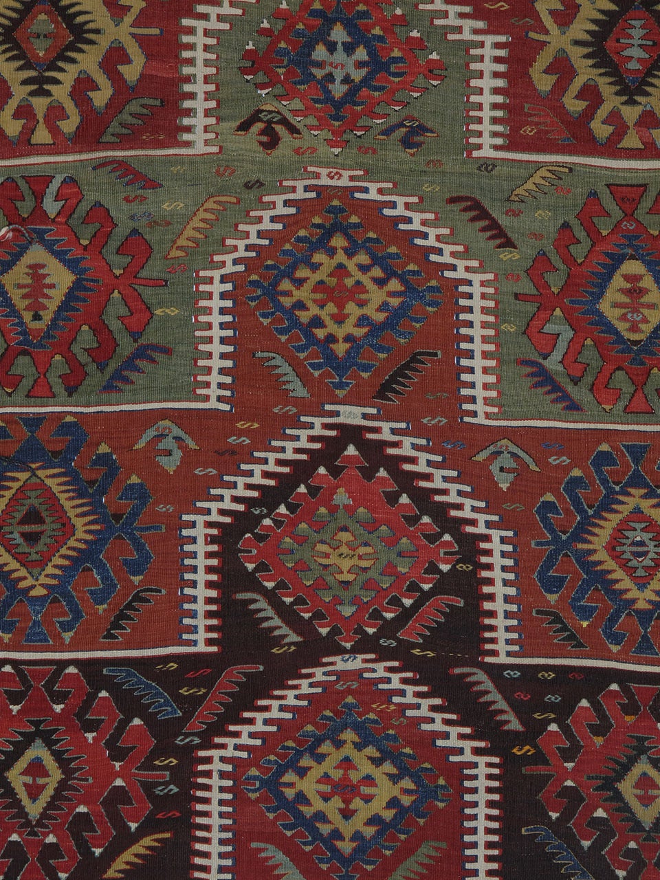 Kilim Rug with ascending arches. A beautiful example of Anatolian Kilim rug weaving tradition from West-Central Turkey, displaying a well-known design of stacked arches, often assumed to be a prayer rug variant, but probably with a more archaic